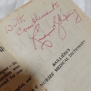 Baillière's Nurses' Medical Dictionary/RUDY KIPLING Signature